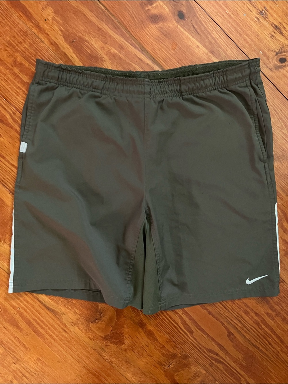 Nike Dri-FIT running shorts mens medium olive green reflective stripe